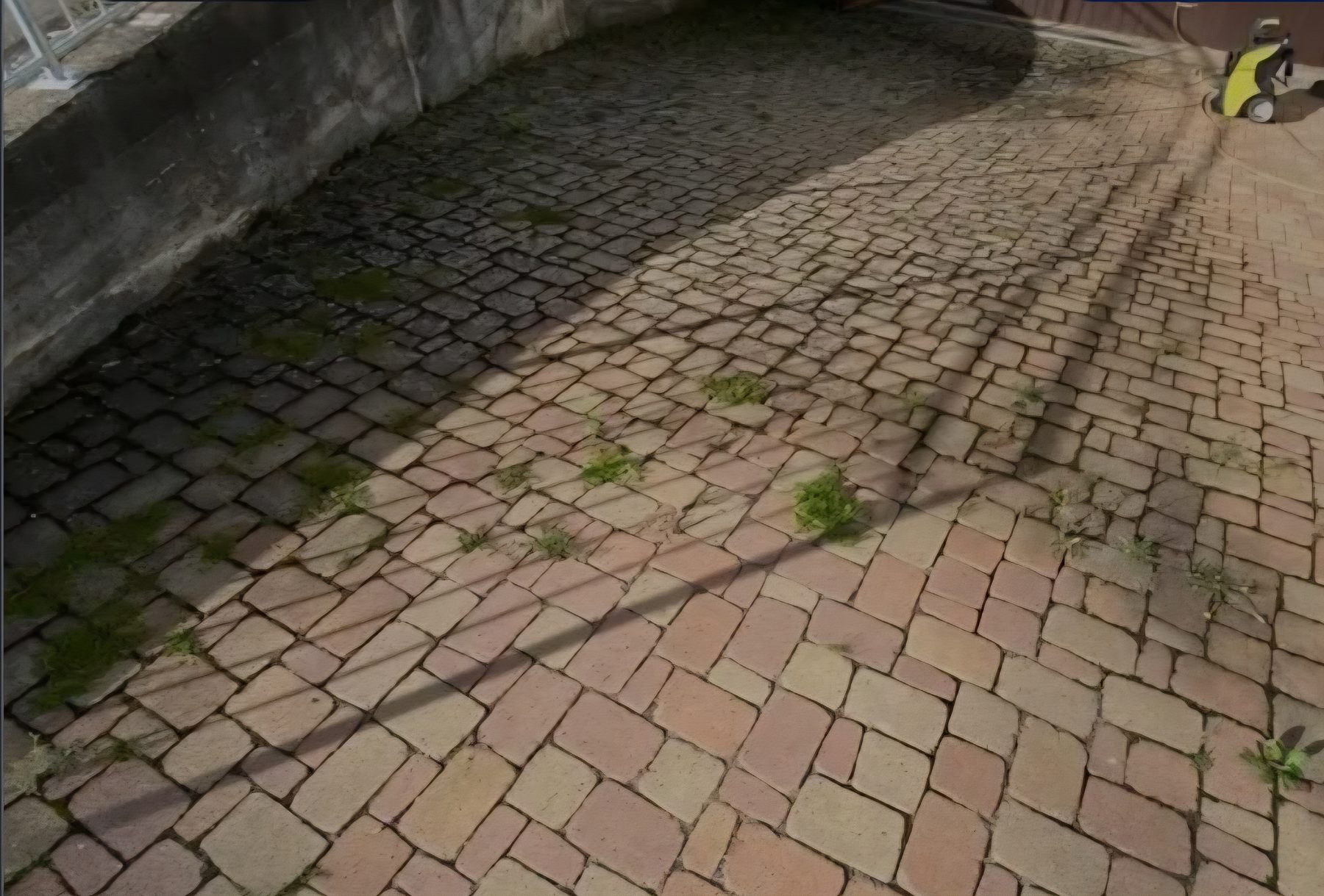 Paved area before cleaning